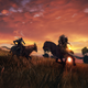 Two warriors on horseback joust on a field as the sun sets.